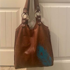 Leather handbag, peacock feather design